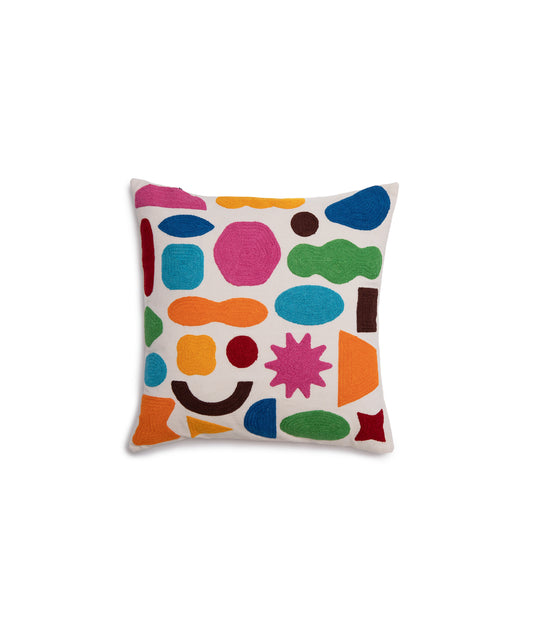 Image of the Odds and Ends Pillow Cover with a variation of organic shapes in blue, green, pink, brown, yellow, and orange on a white base. Pillow Cover is 100% cotton and measures 18 inches square.